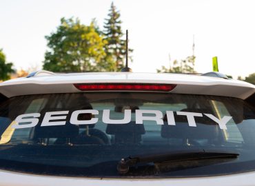 Security,Car,Patrolling,Streets,Before,Sunset